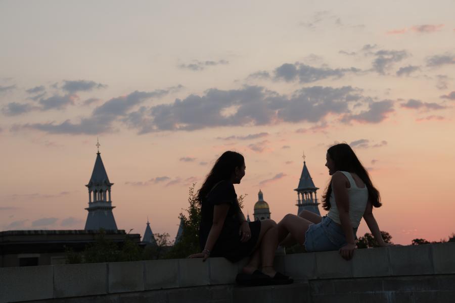 two students sunset